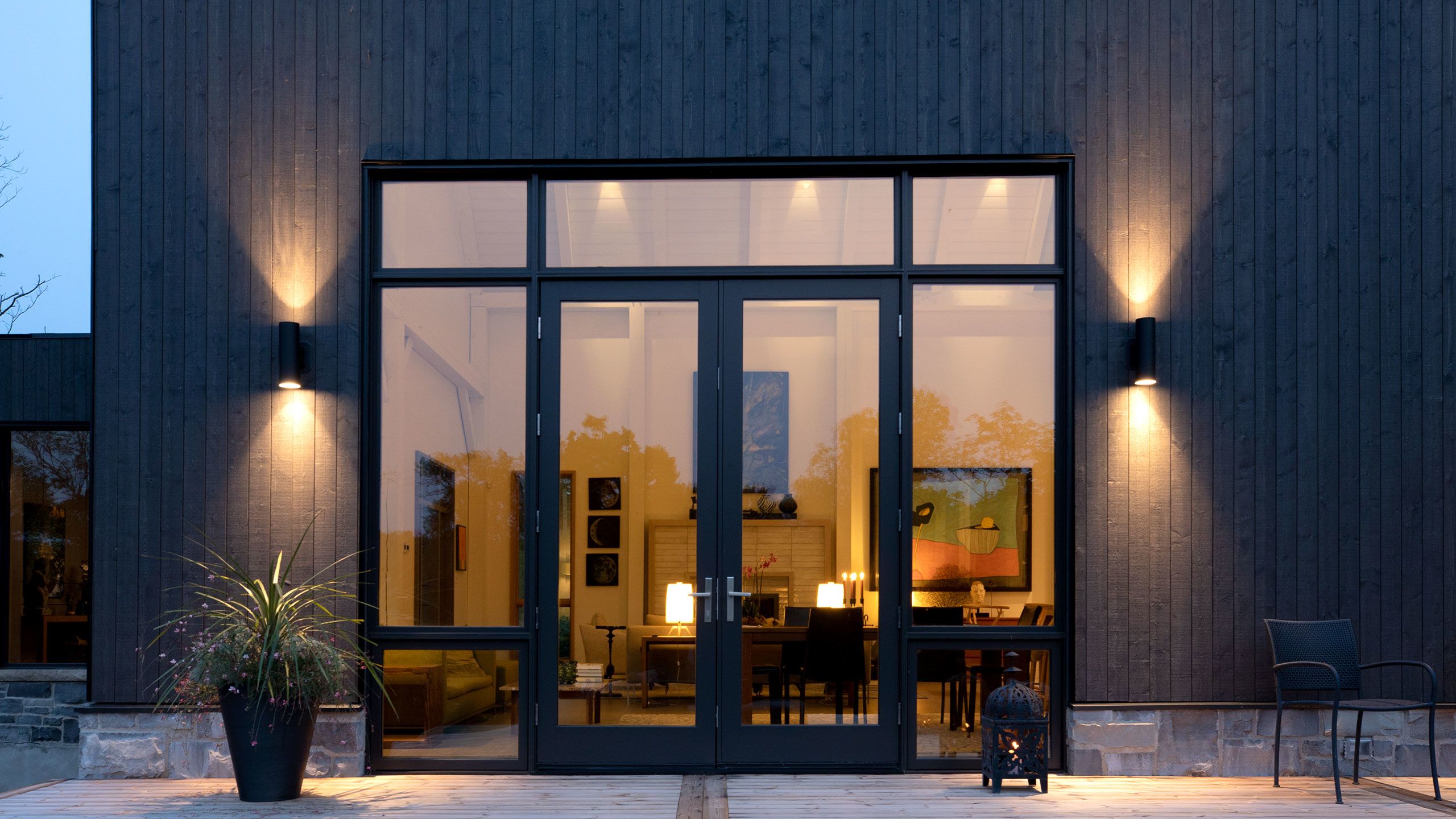 Night view of the interior of the house from the deck